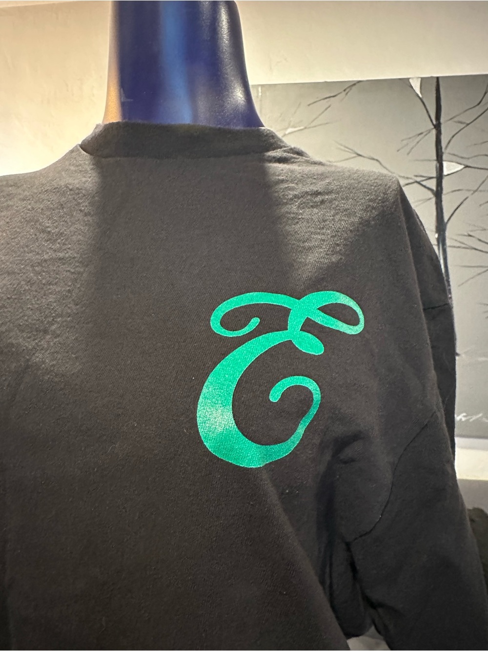 Black Tee with Green Script 'E' Graphic